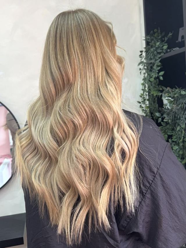 Long blonde waves by C.K.HAIR